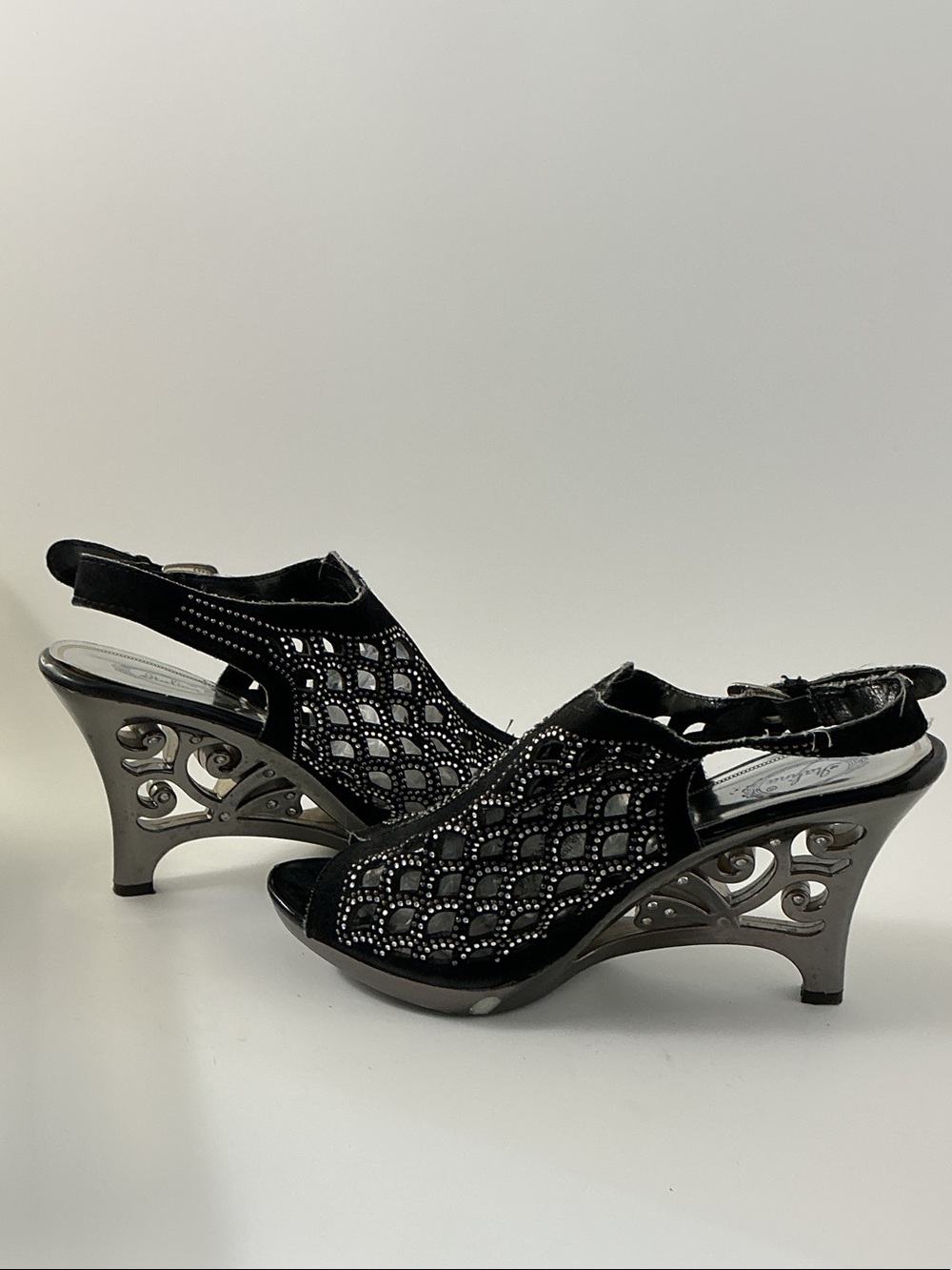 Italina Black Peep-Toe Slingback 4” Heels with Decorative Metal Cutout Wedge